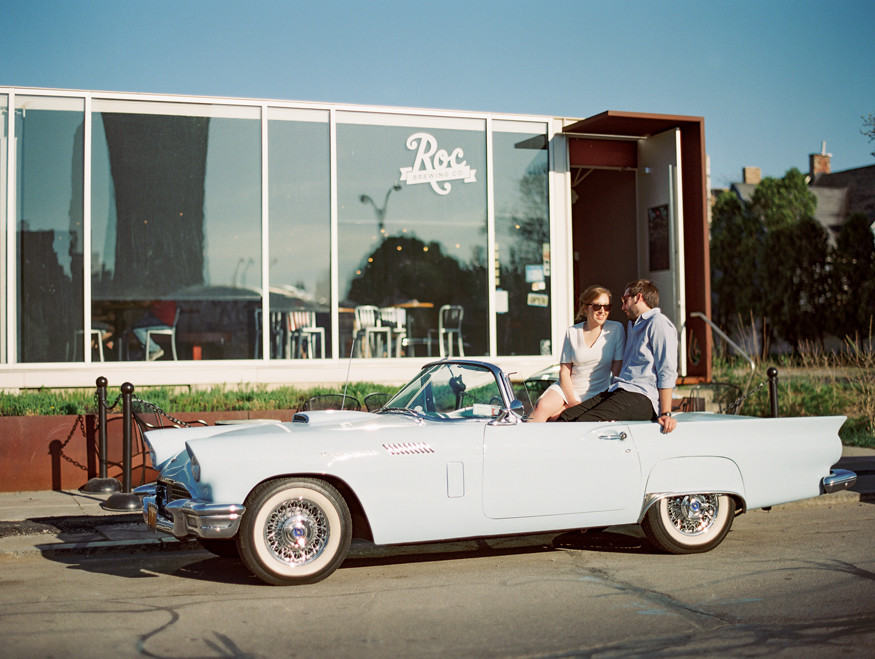 Outside Roc Brewing Co with vintage convertible and couple engagement photo | Mary Dougherty
