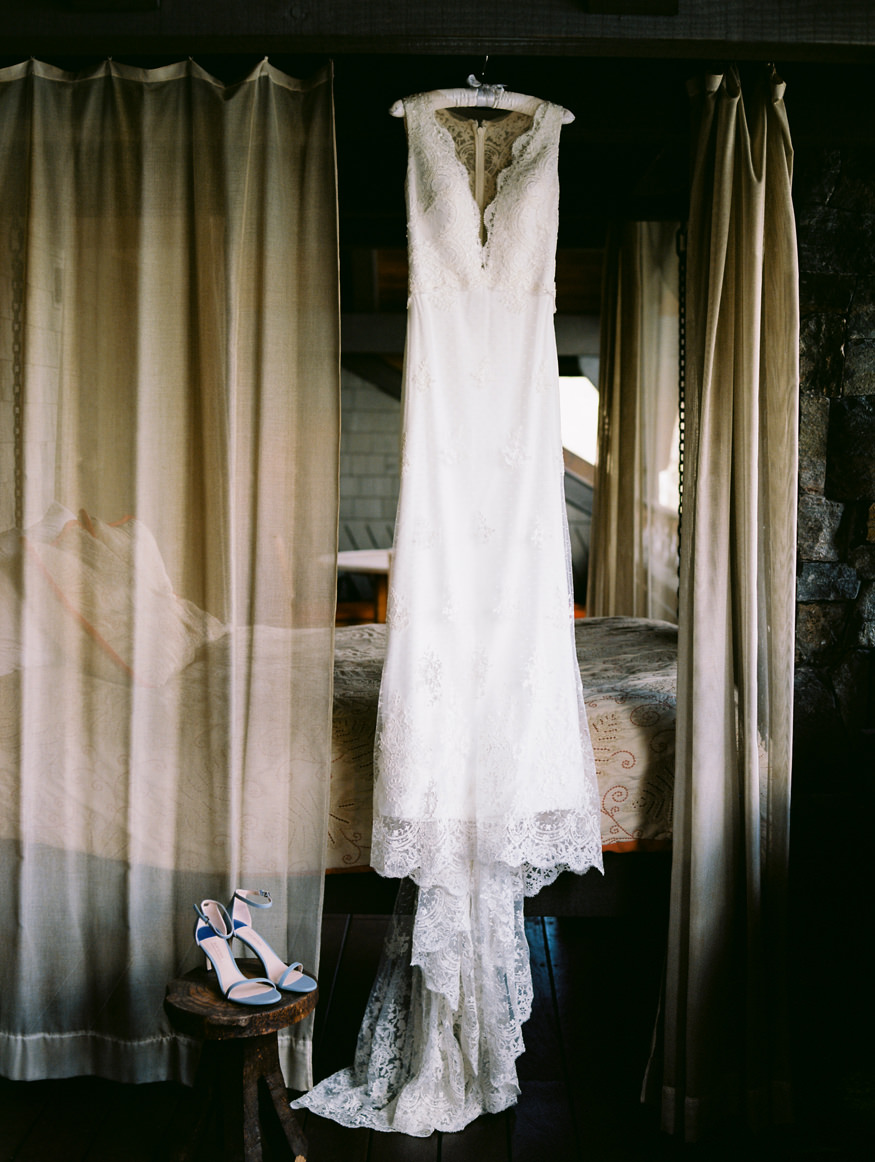 Wedding dress hanging in the Whiteface Suite
