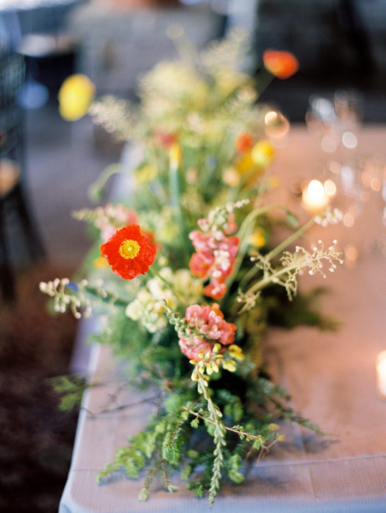 meadow floral installation for wedding sweetheart table with Icelandic Poppies by Little Farmhouse Flowers | Mary Dougherty