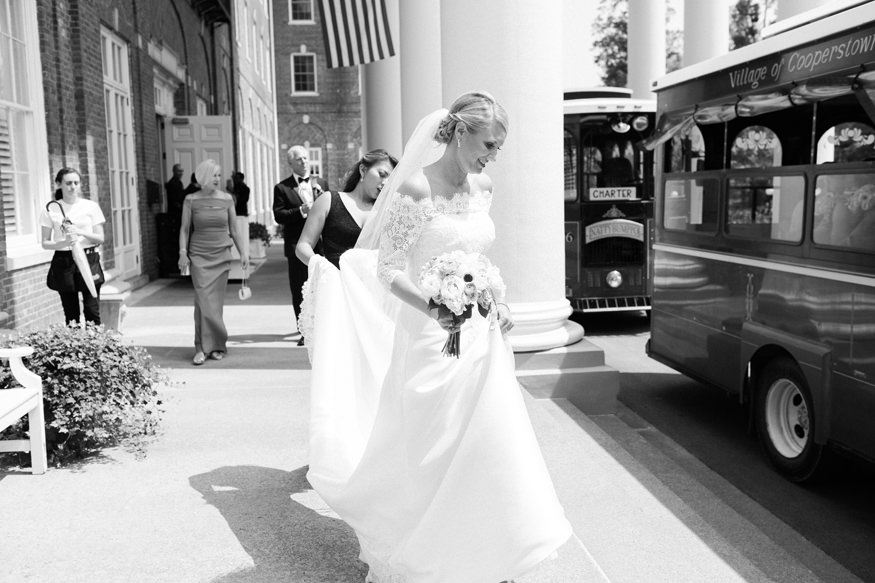 bride walking to trolley at Otesaga | Mary Dougherty