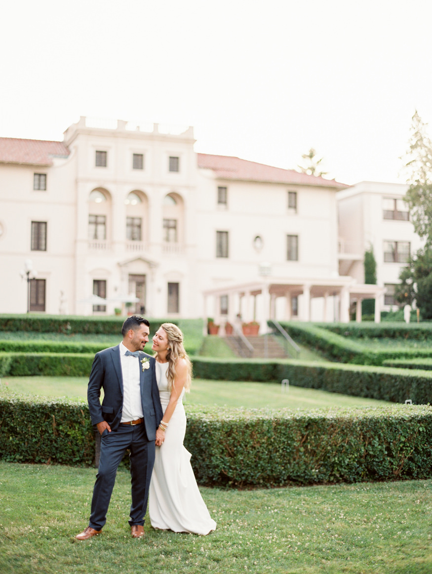 Bride and groom in garden at Geneva on the Lake Modern estate New York | Mary Dougherty