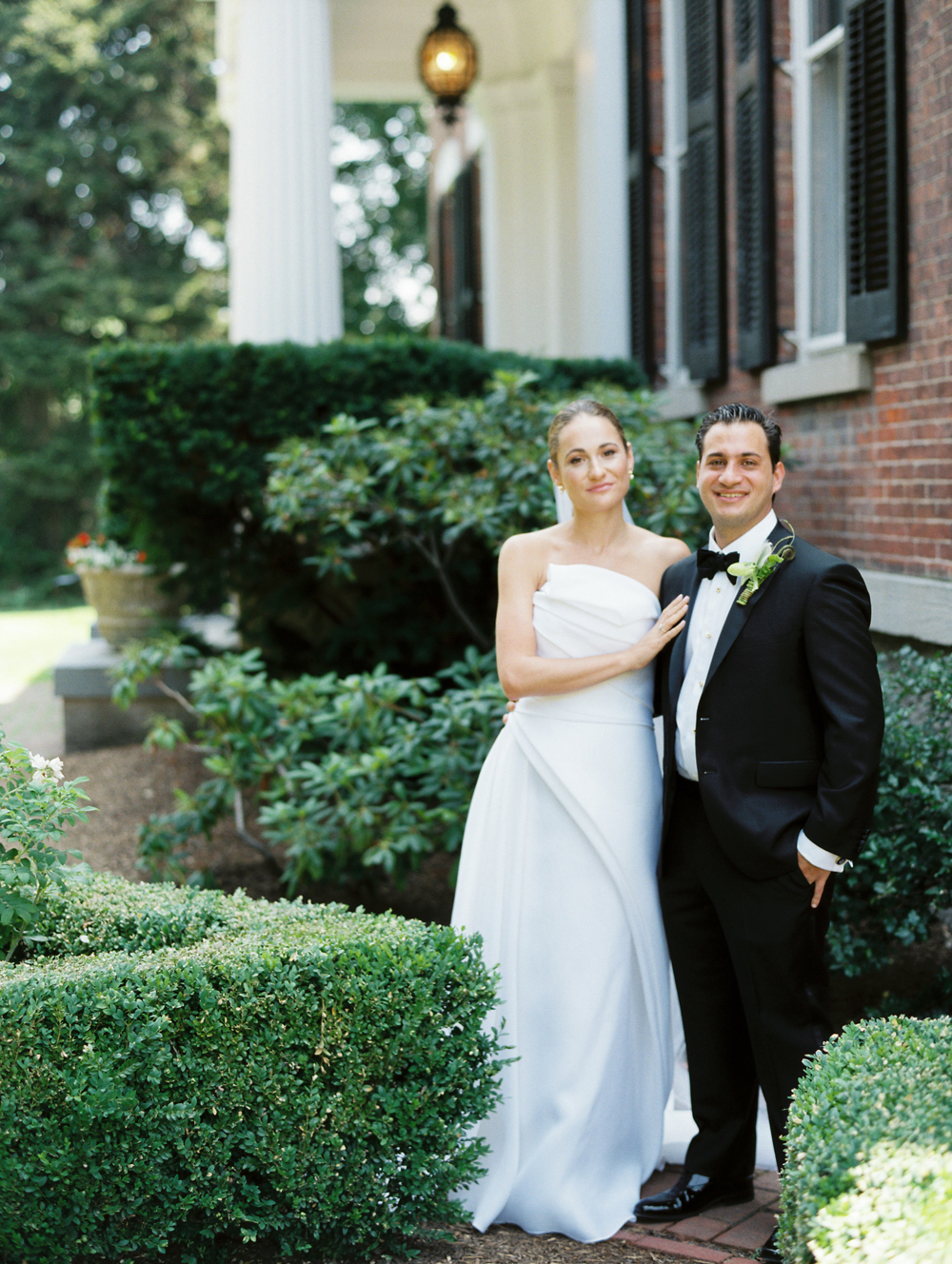 bride and groom outside Genesee Valley Club on Wedding day | Mary Dougherty Photography