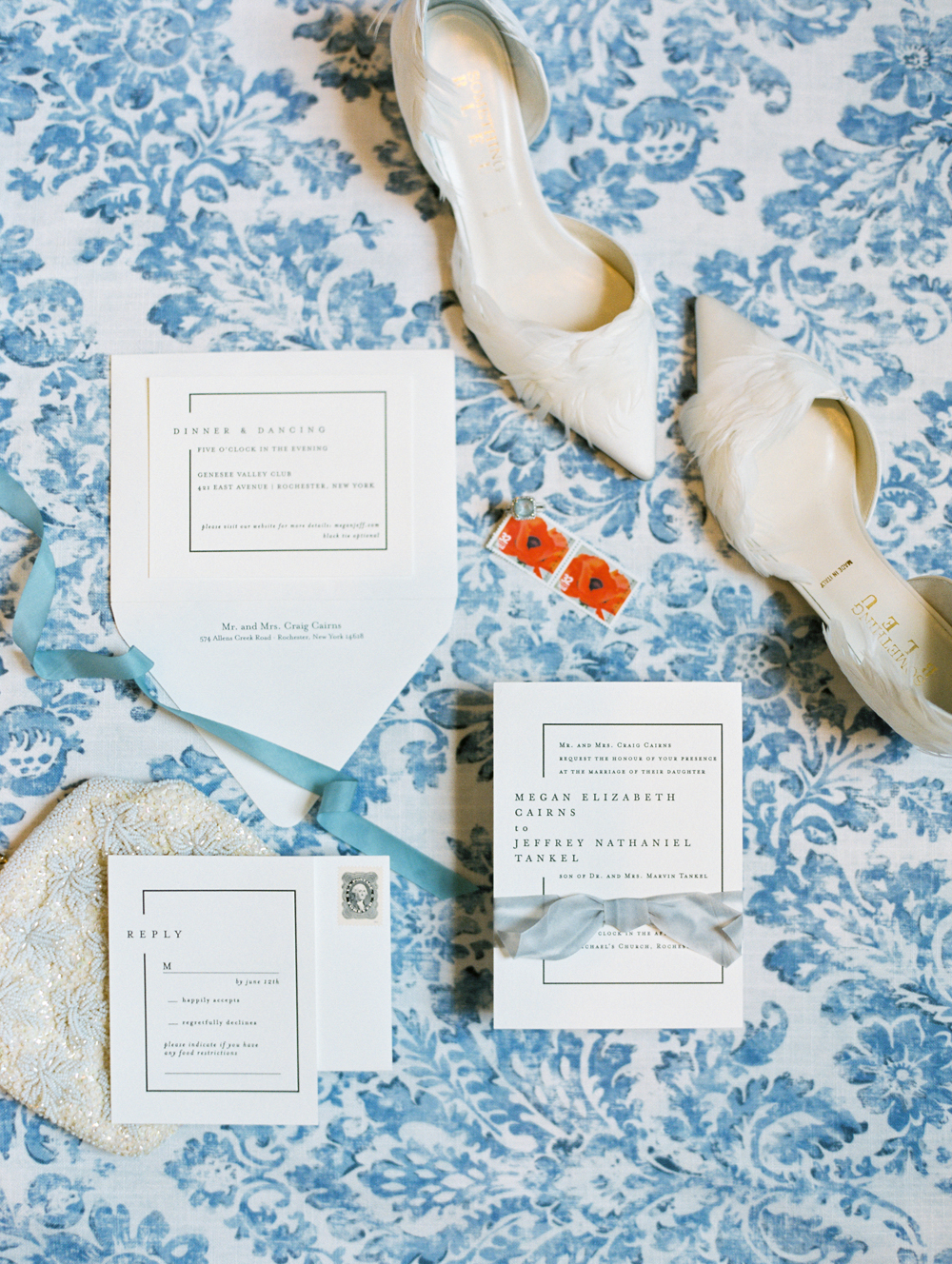 custom blue linen flatlay with invitation, shoes and purse for wedding at Genesee Valley Club | Mary Dougherty