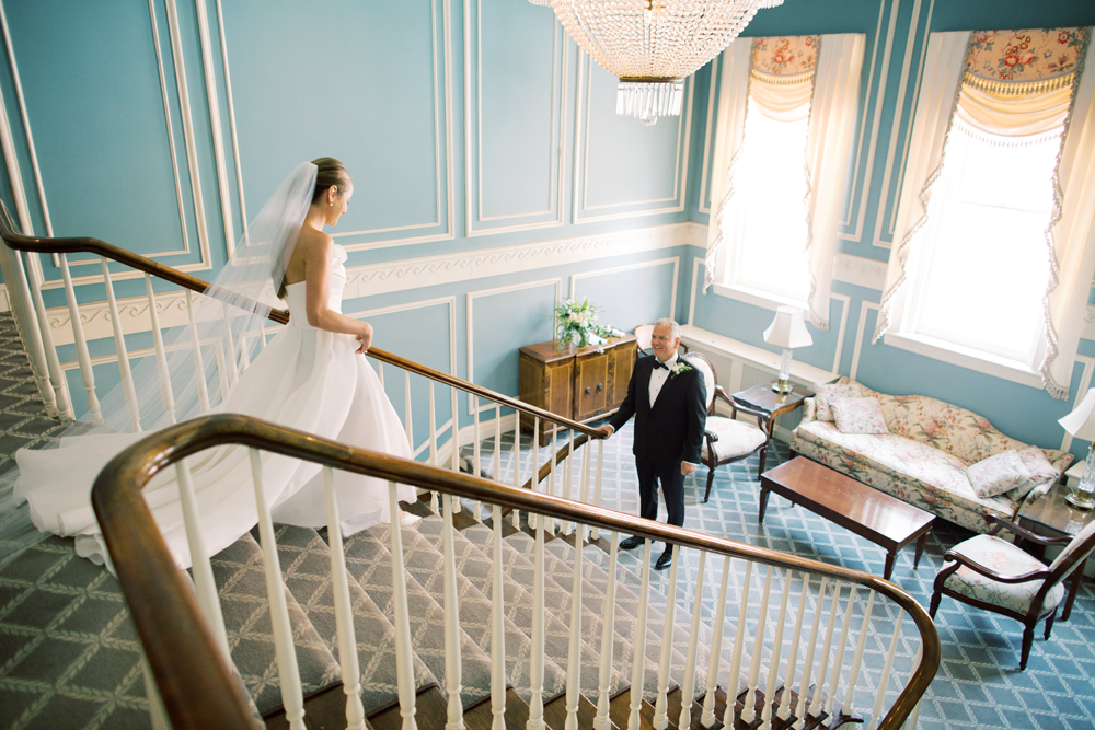 bride walks down stairs to see dad on wedding day first look at Genesee Valley club | Mary Dougherty