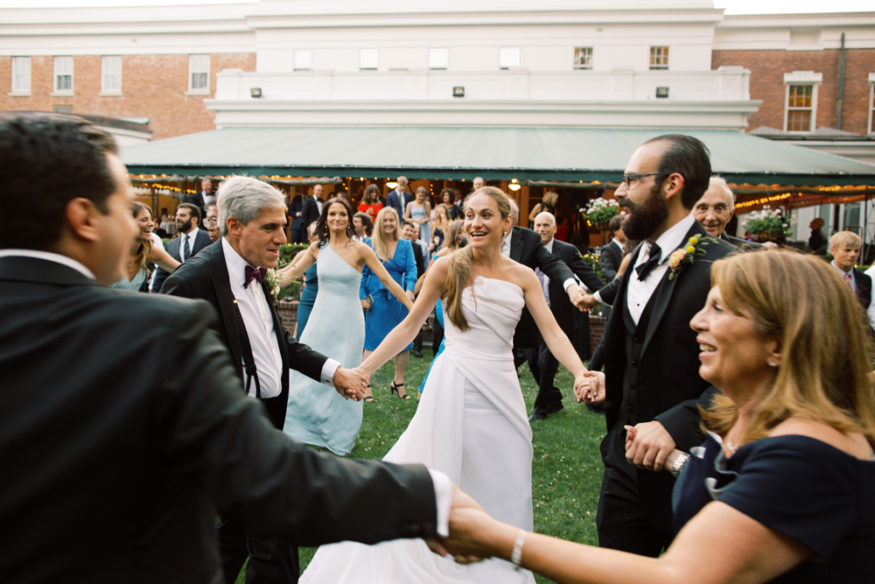 dancing outside on lawn at Genesee Valley Club hora | Mary Dougherty