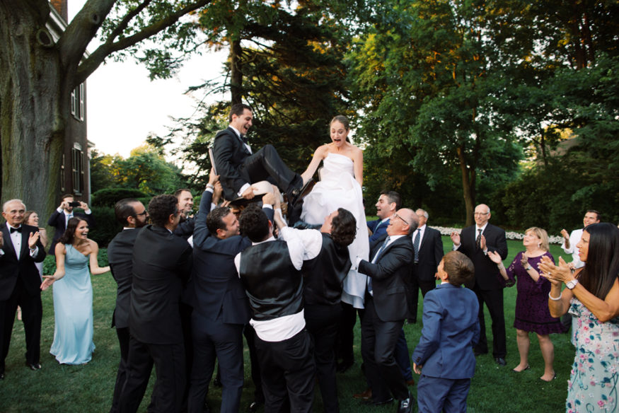 dancing outside on lawn at Genesee Valley Club hora | Mary Dougherty