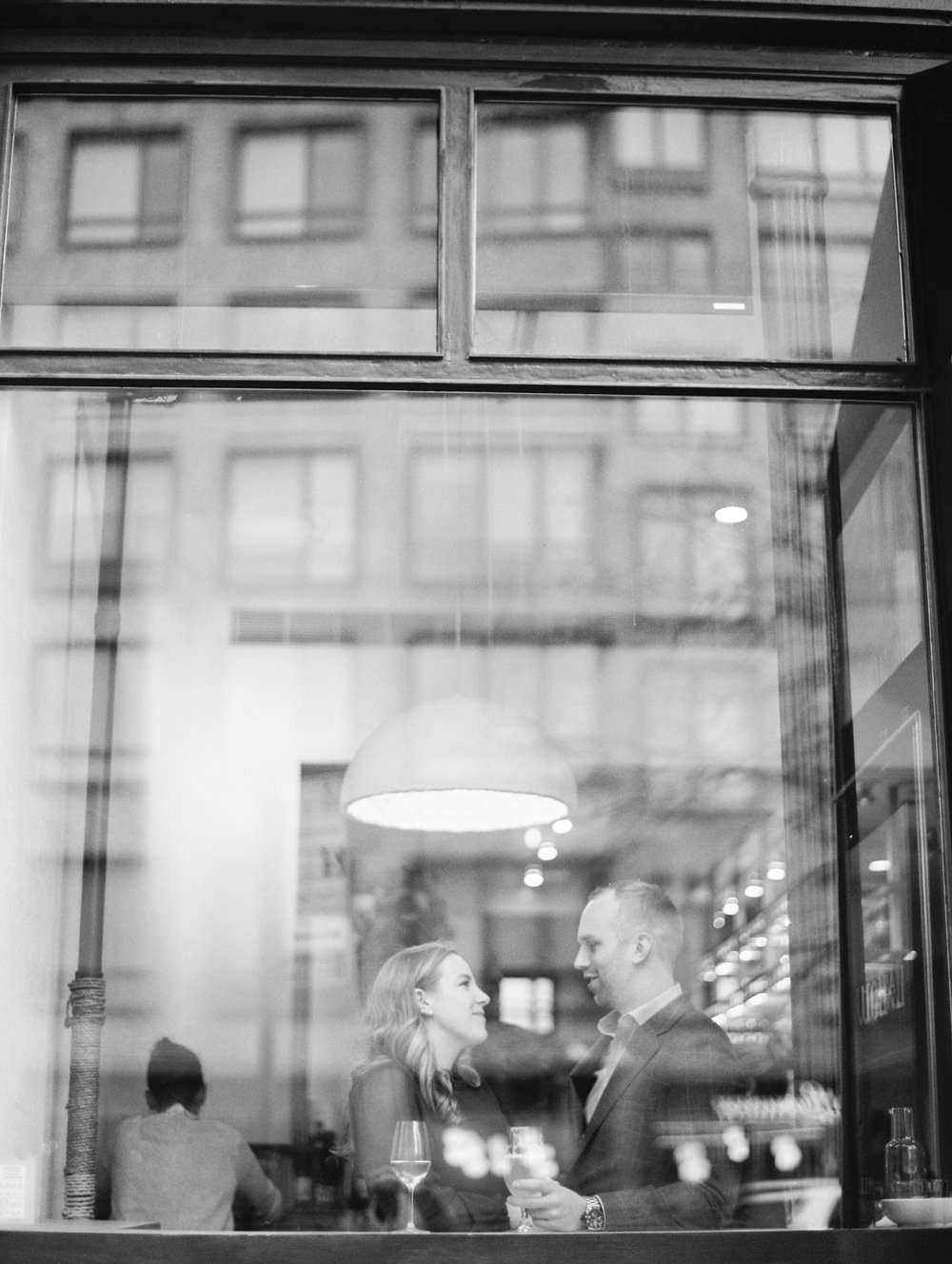 couple in restaurant la lou prospect heights brooklyn engagement session photos by Mary Dougherty