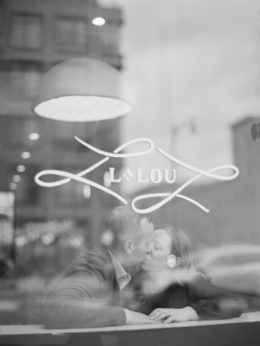 couple in restaurant la lou prospect heights brooklyn engagement session photos by Mary Dougherty