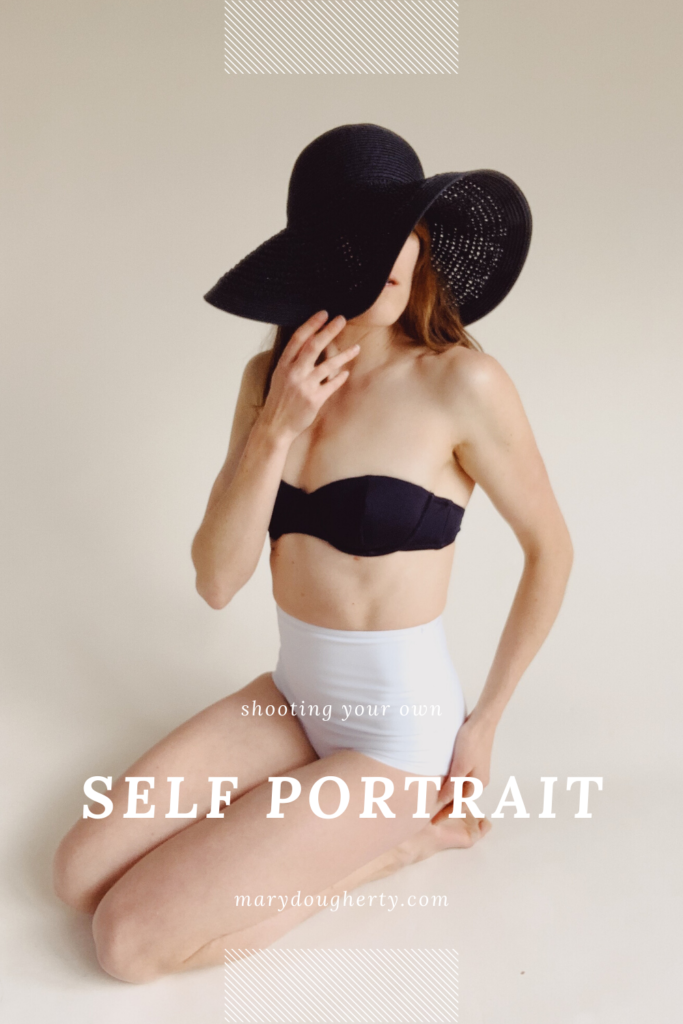 self portrait of woman in bathing suit with black straw hat in home studio pinterest