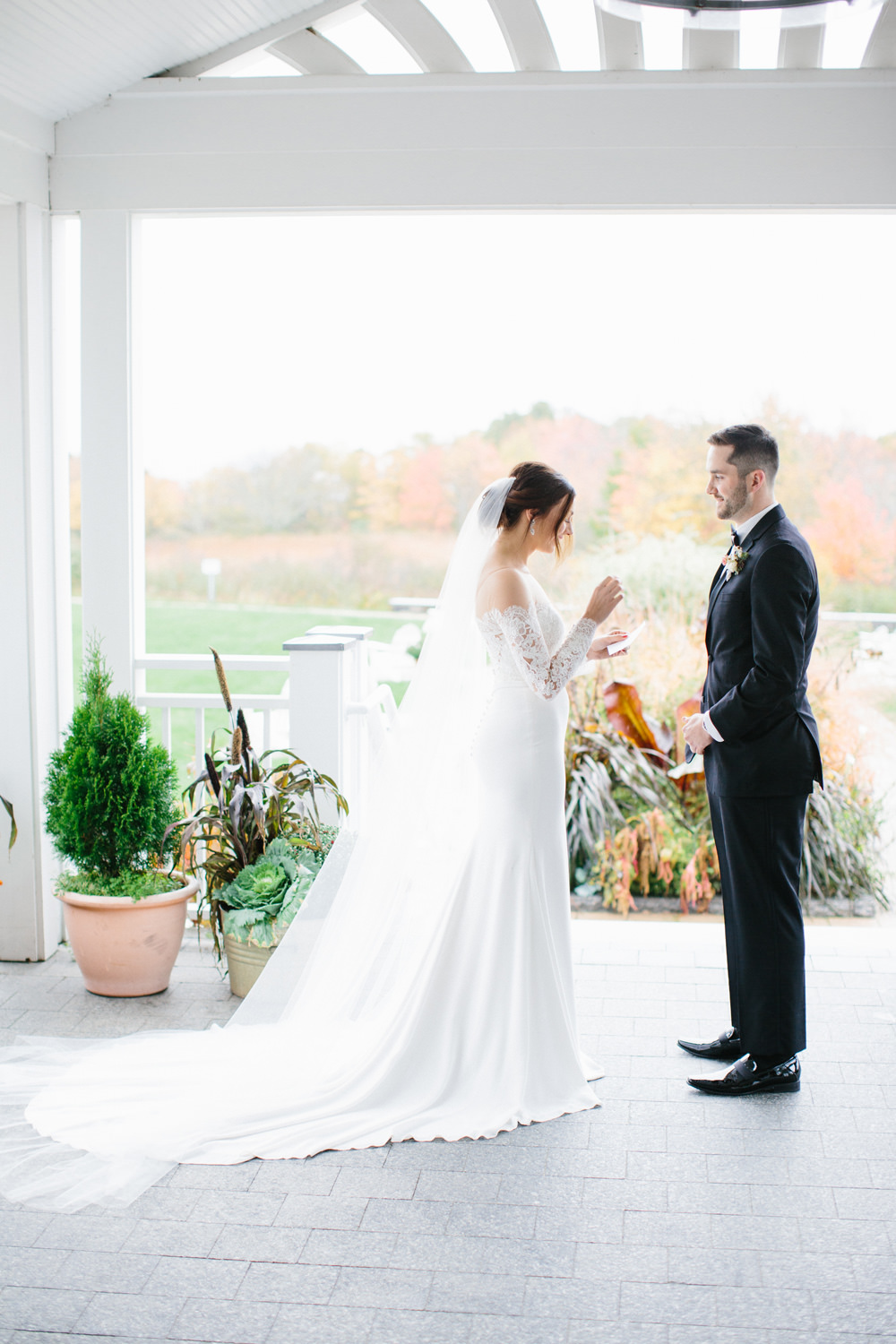 saying wedding vows at Inn by the Sea during Portland Maine elopement | Mary Dougherty