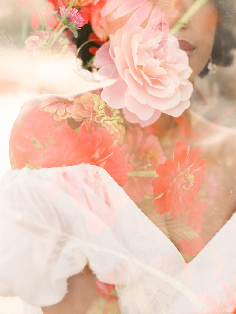 2020 Adirondack Wedding Workshop | double exposure image of a red and pink bouquet and bride with off the shoulder dress overlayed by Mary Dougherty