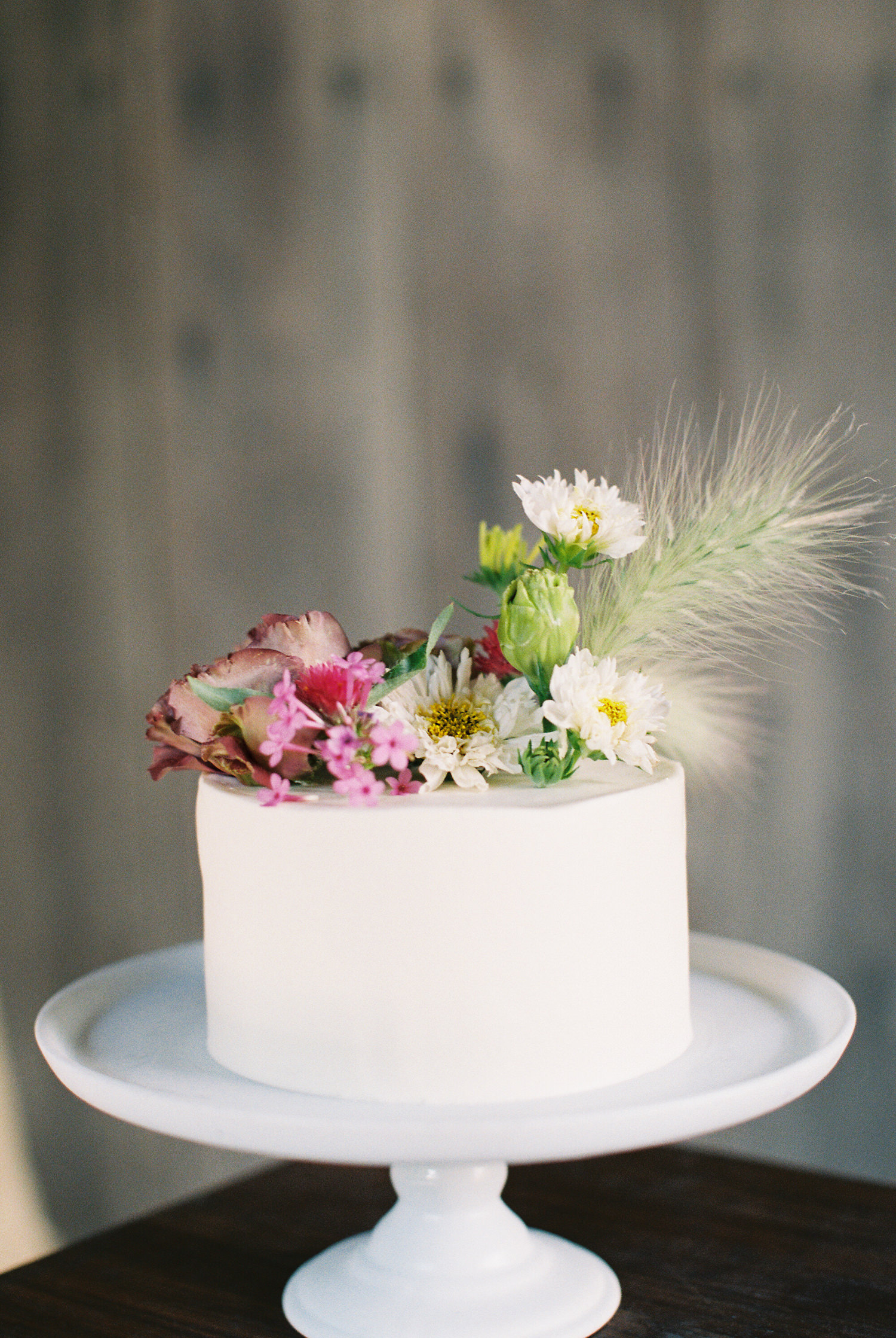 Petit Wedding Cake decorated with flowers at Stone Hill farm | photographed by Mary Dougherty 