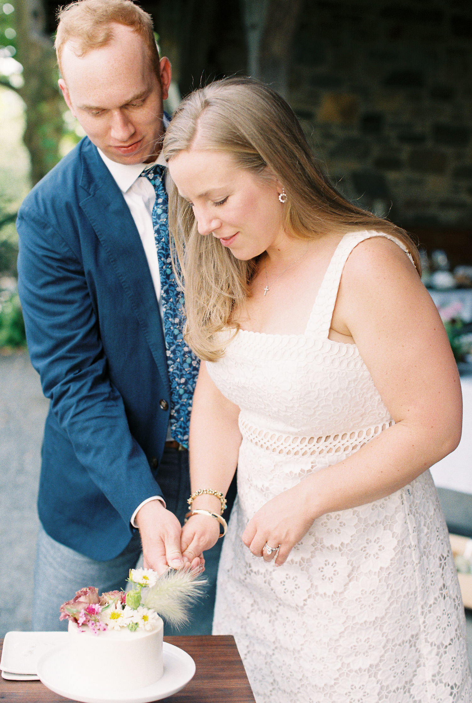 Bride and Groom cut wedding cake at Blue Hill at Stone Barns Wedding | photographed by Mary Dougherty 