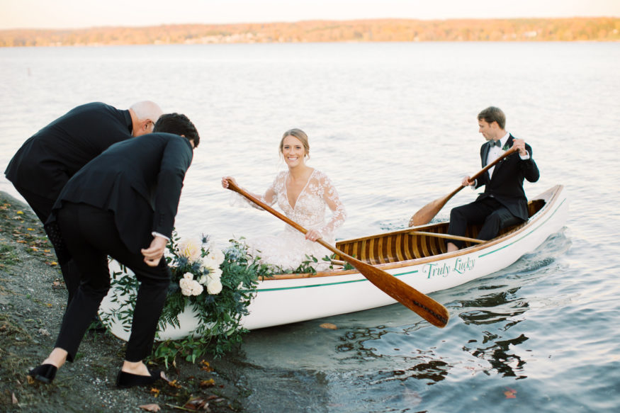 Bride and groom canoeing on the Chautauqua Lake in New York