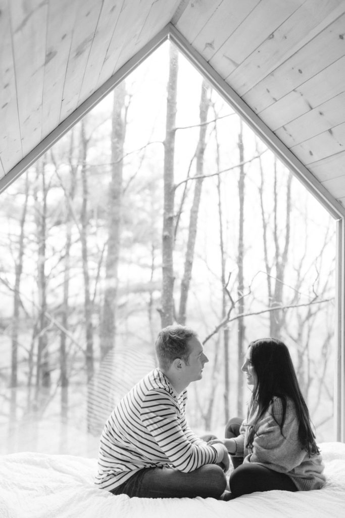 Black and white photo of a couple in Gather Greene cabins
