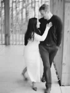 Couple walks in motion blurry shot on film at the Pavilion at Gather Greene a Catskills wedding venue film photo by Mary Dougherty