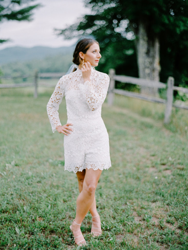 Mountain Elopement Style | Lace romper with low pony and long lace bow | Mary Dougherty