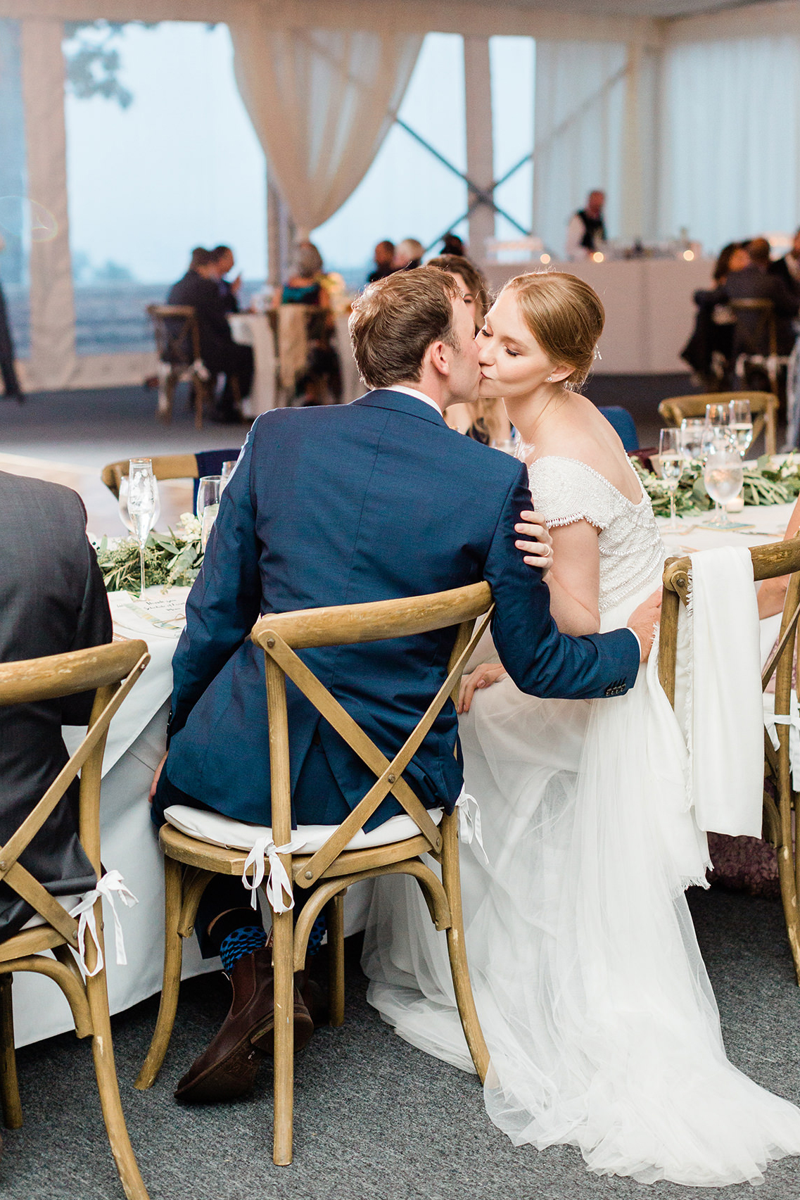 Bride and groom embracing during a Sleepy Hollow wedding reception
