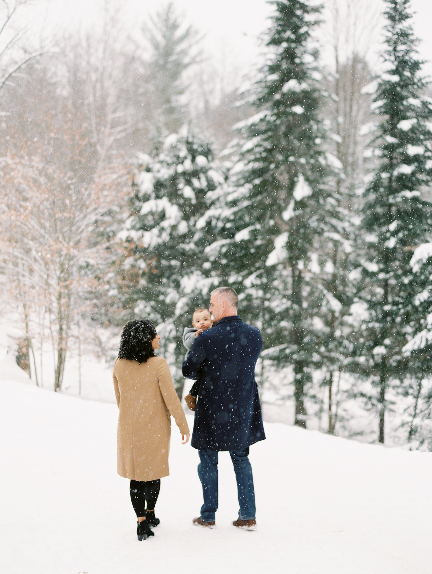 Winter family photo in snow with 1 year old. Lake Placid, New York by Adirondack Photographer Mary Dougherty