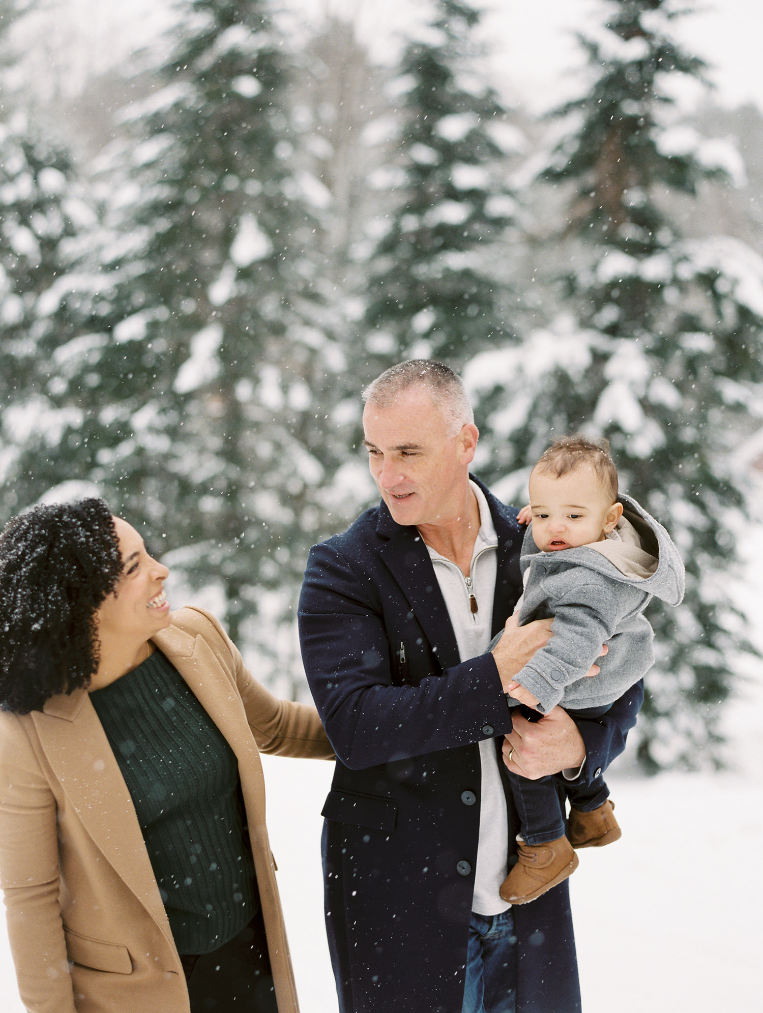 Winter family photo in snow with 1 year old. Lake Placid, New York by Adirondack Photographer Mary Dougherty