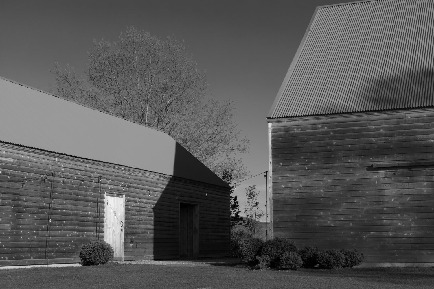 black and white photo of barns at INNESS a Hudson Valley resort and wedding venue